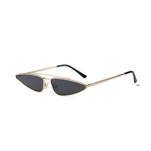 modern womenswear sunglasses streetwear inspired with dark grey lenses and gold frame