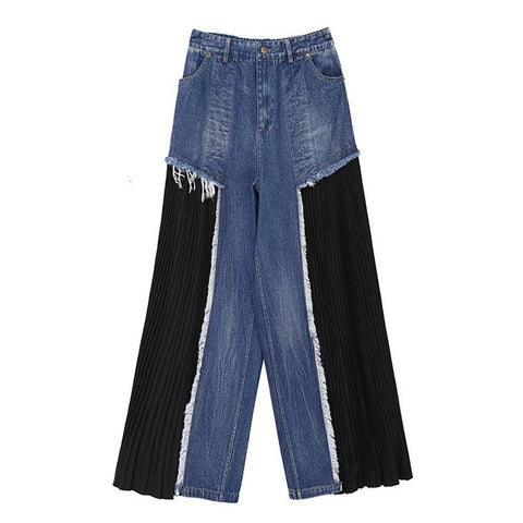 womens fashion trousers inspired by streetwear featuring a wide leg, frayed denim and black fabric inserts
